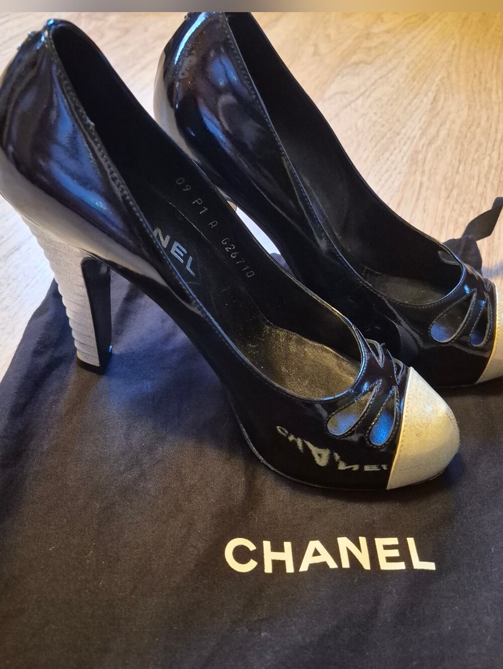 CHANEL Black Patent Pumps with Gold Cap Toe